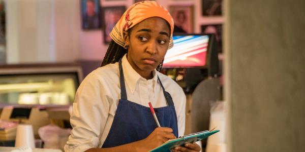 The Bear season 2: Sydney writing on pad in the kitchen 