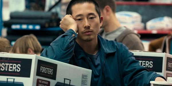 Steven Yeun as Danny looking bored in Beef