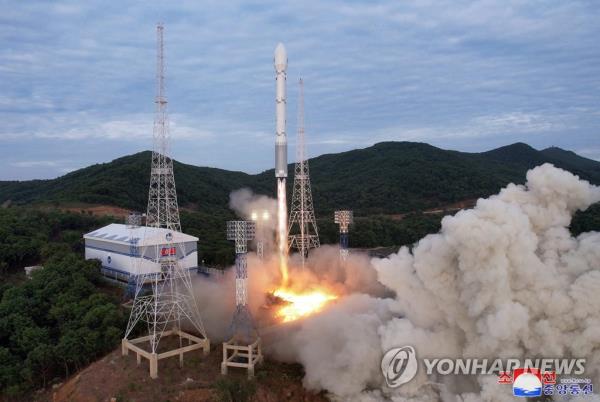 This photo provided by North Korea's Korean Central News Agency on June 1, 2023, shows the launch of the North's new Chollima-1 rocket, allegedly carrying a military reco<em></em>nnaissance satellite, Malligyong-1, from Tongchang-ri on the North's west coast at 6:29 a.m. the previous day. (For Use o<em></em>nly in the Republic of Korea. No Redistribution) (Yonhap)